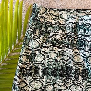 Snake skin slip on shorts, with green hints